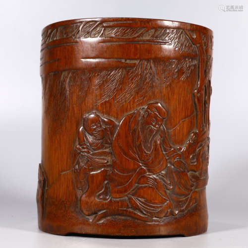 A carved bamboo figure brush pot