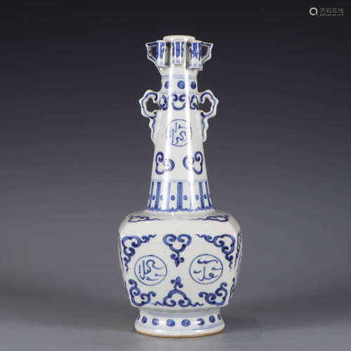 A blue and white sanskrit square bottle vase