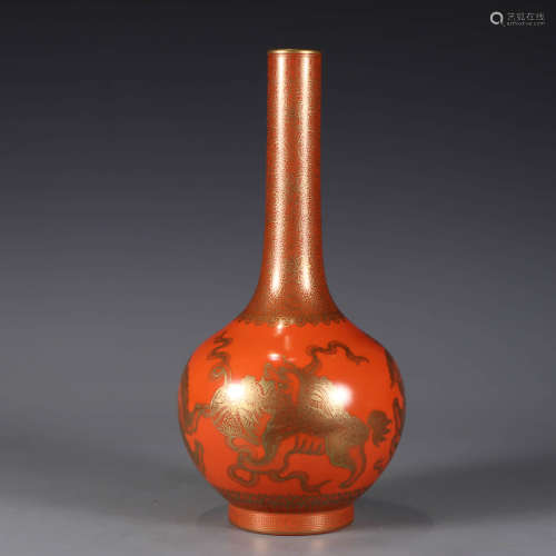A gilt-inlaid iron-red dragon bottle vase