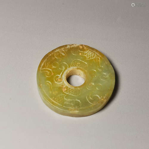 An archaistic yellow jade bi