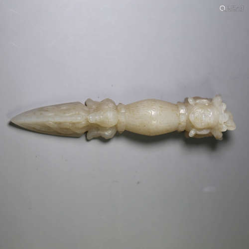 A carved jade buddhist implement