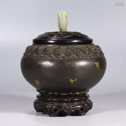 a gilt bronze alms incense burner