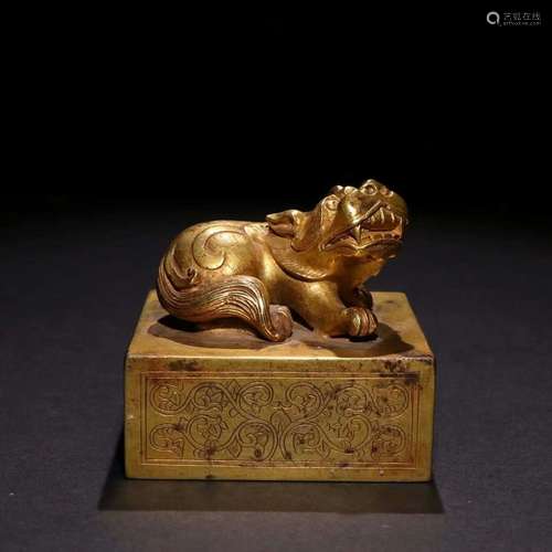 A gilt-bronze beast seal