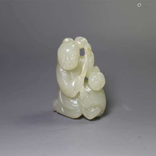 A carved jade figure pendant