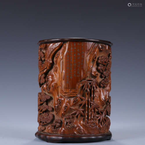 A carved bamboo crane and pine brush pot