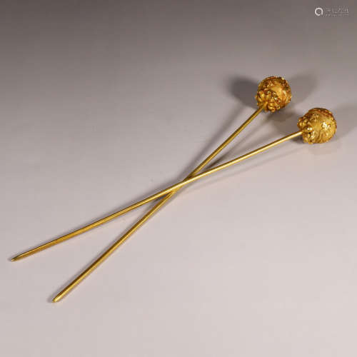 A pair of gilt and silver inlaying hairpins