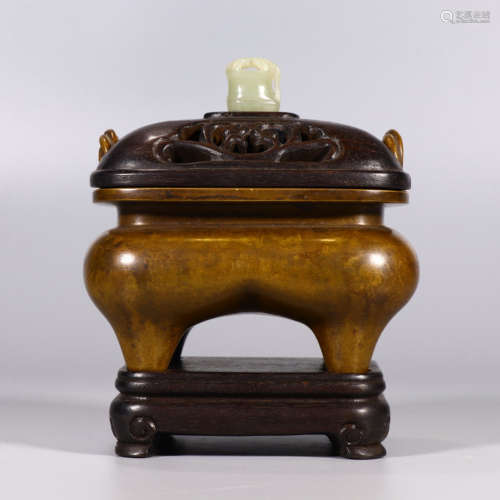 A bronze double-eared incense burner