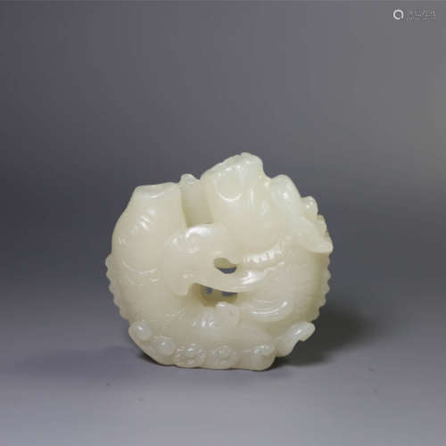 a jade dragon and fish vase