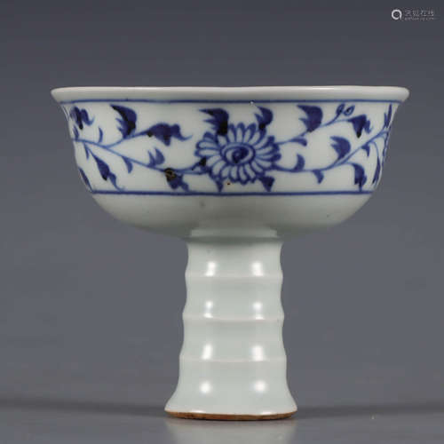 A blue and white interlocking lotus stem cup