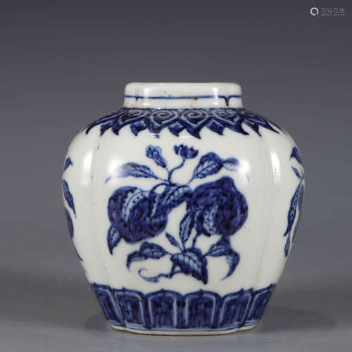 A blue and white fruits and flowers jar