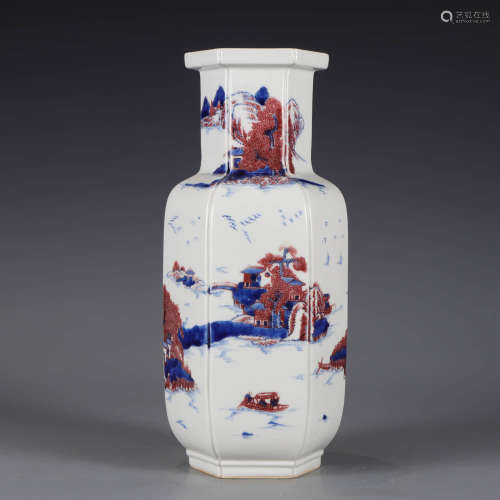 A underglazed-red blue and white landscape vase