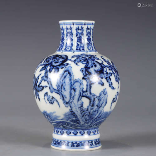 A blue and white mountain and sea vase