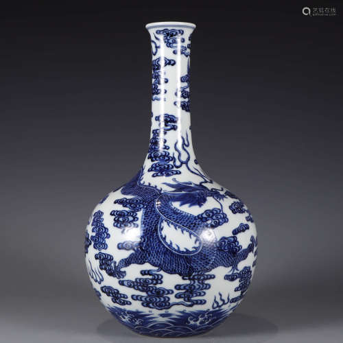 A blue and white dragon bottle vase