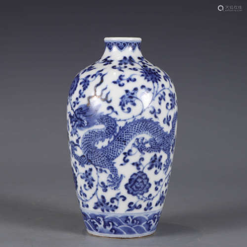 A blue and white dragon and flower vase