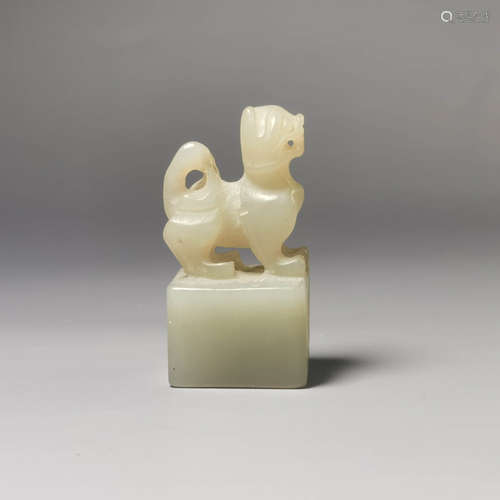 A carved jade auspicious beast seal