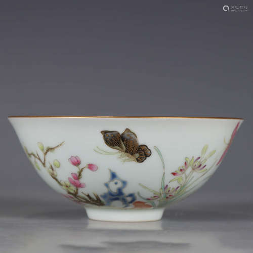 A famille rose flower and butterfly bowl
