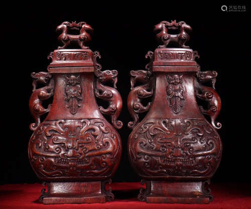 PAIR OF CHENXIANG WOOD VASE CARVED WITH BEAST