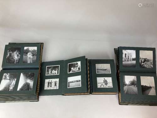 Four albums of early 20th century black and white photograph...