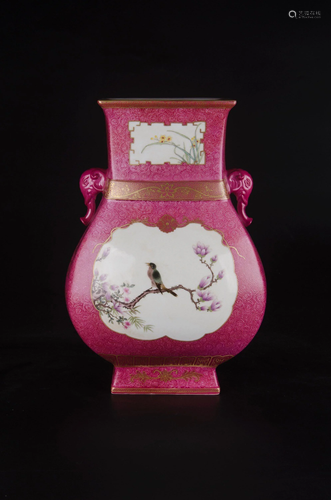 A RUBY-RED GROUND FAMILLE-ROSE VASE.MARK OF QIANLONG