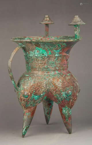 A BRONZE WINE VESSEL