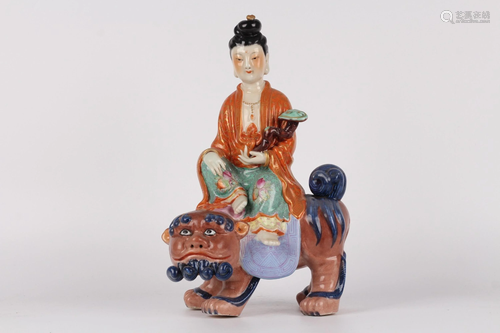 A FAMILLE-ROSE PORCELIAN GUANYIN