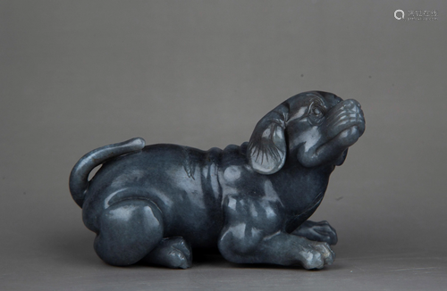 A CARVED JADE DOG