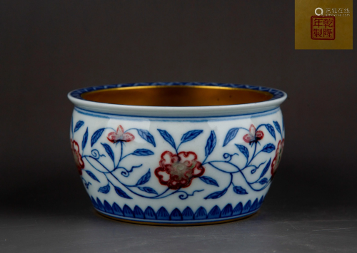AN IRON-RED BLUE AND WHITE WASHER.MARK OF QIANLONG