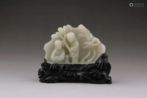 A CARVED WHITE JADE HEHE GROUP
