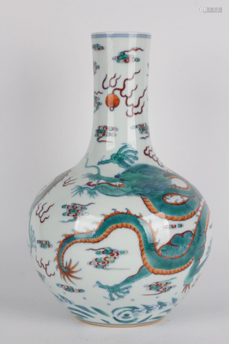 A DOUCAI-BLUE AND WHITE 'DRAGON' VASE.MARK OF QIANLO…