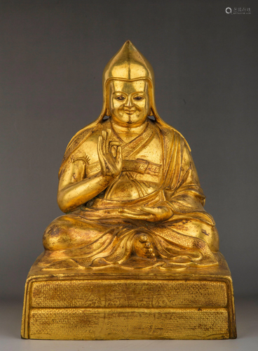 A GILT-BRONZE FIGURE OF TSONGKHAPA