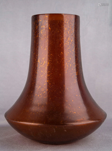 AN AMBER GLASS VASE