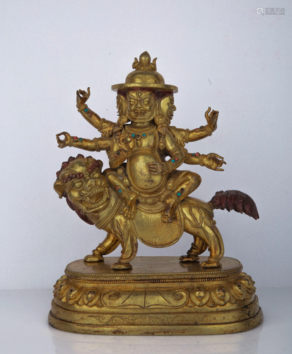 A GILT-BRONZE FIGURE OF GUARDIAN