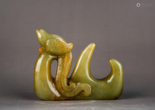 A CARVED JADE PENREST