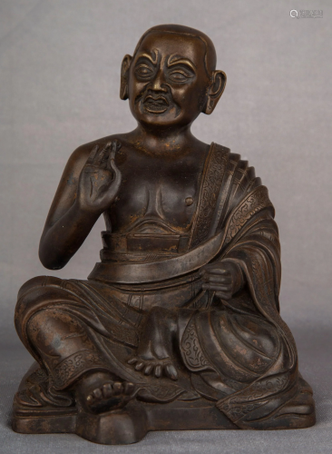 A BRONZE FIGURE OF LUOHAN