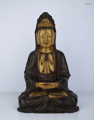 A GILT-BRONZE FIGURE OF GUANYIN