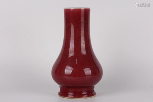 A SACRIFICIAL-RED-GLAZED VASE