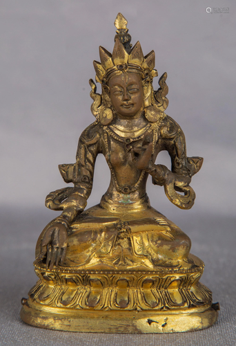 A GILT-BRONZE FIGURE OF TARA