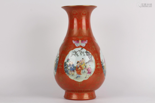 A COPPER-RED GROUND FAMILLE-ROSE VASE.MARK OF QIANL…