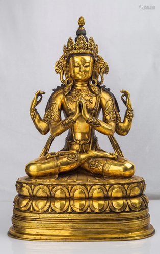 A GILT-BRONZE FIGURE OF GUANYIN