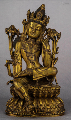 A GILT-BRONZE FIGURE OF GUANYIN