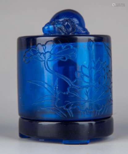 A CARVED BLUE -GLASS BOX AND COVER