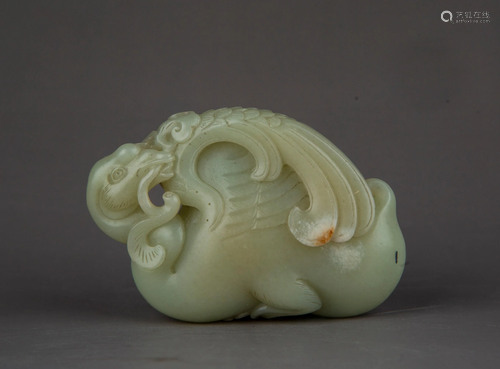 A CARVED JADE CRANE