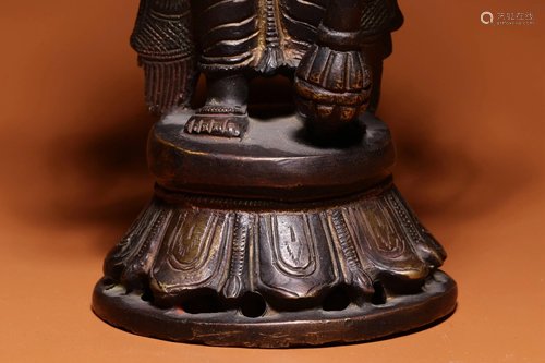 A BRONZE BUDDHA