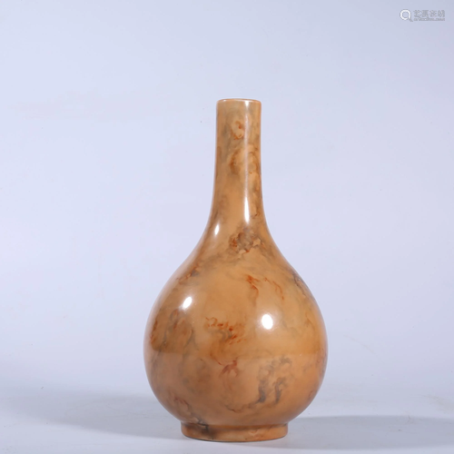 A WOOD-GLAZED BOTTLE VASE.MARK OF QIANLONG