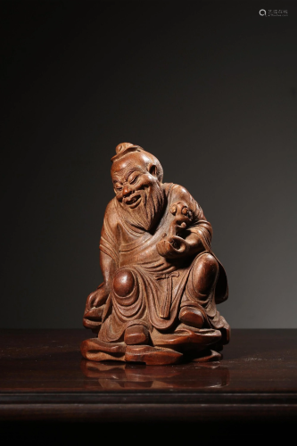 A CARVED BAMBOO FIGURE .QING PERIOD