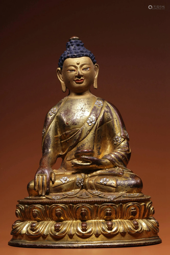 A GILT-BRONZE FIGURE OF SHAKYAMUNI.QING PERIOD