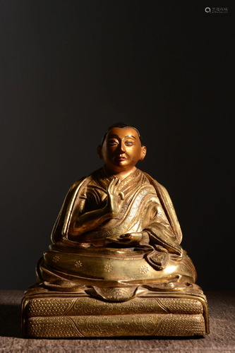 A GILT-BRONZE FIGUR EOF GURU.18TH CENTURY