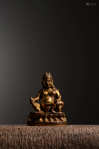 A GILT-BRONZE FIGURE OF YELLOW JAMBHALA.QING PERIOD