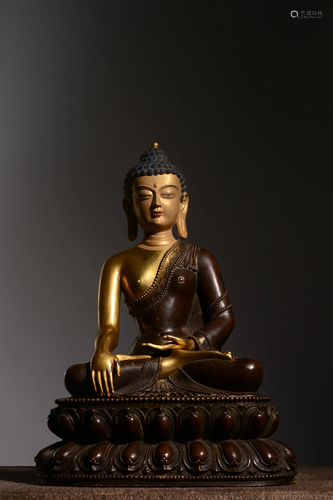 A GILT-BRONZE FIGURE OF BUDDHA