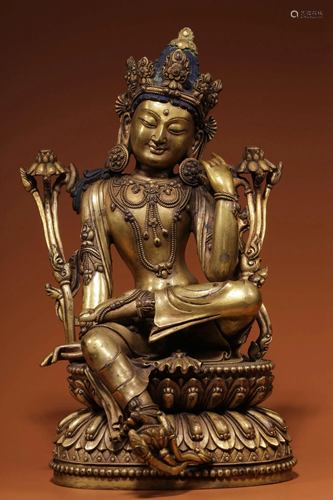 A GILT-BRONZE FIGURE OF GUANYIN.QING PERIOD